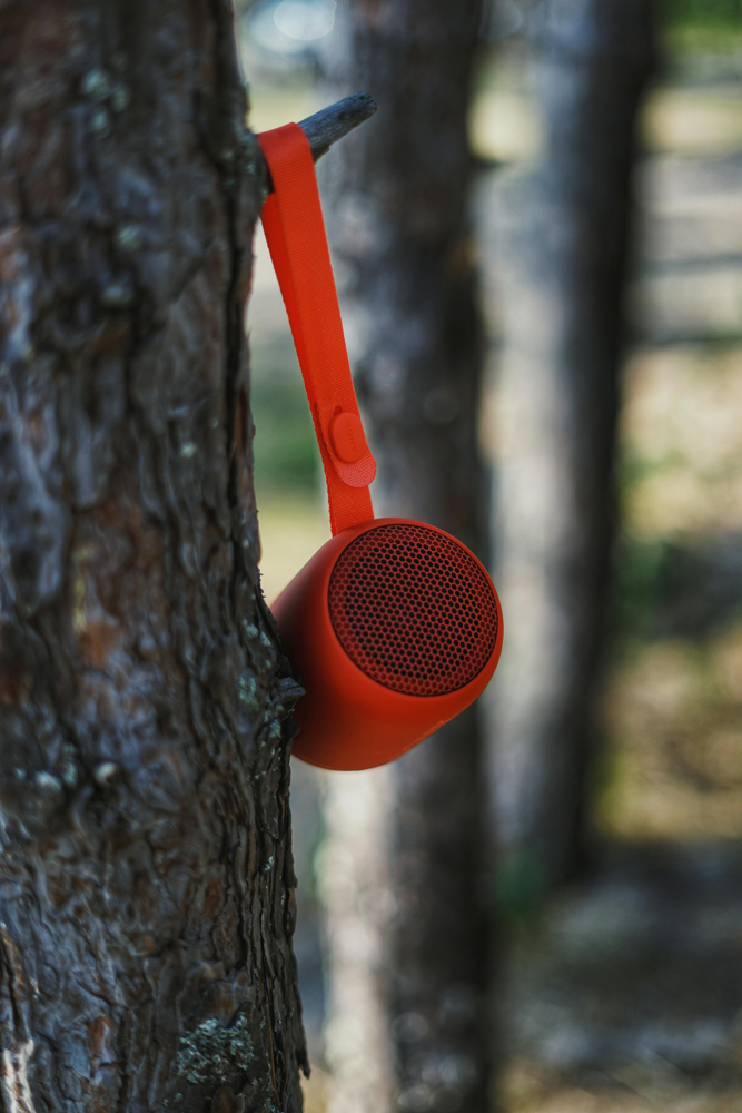 This image showcases a rugged, waterproof Bluetooth speaker designed for outdoor and wet conditions. Devices like these often carry an IPX7 rating or higher, allowing them to withstand rain, splashes, and even brief submersion while still delivering great sound and battery performance.