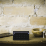 Bluetooth speaker warranty card showing serial number and warranty period